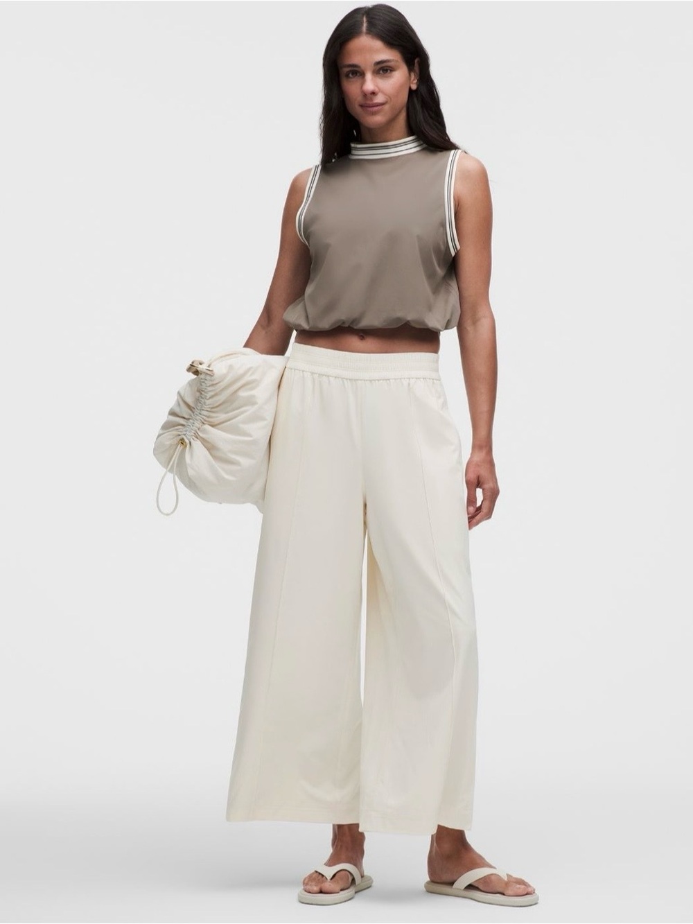 Women's Lululemon Breezily mid rise crop Pants, cream color, size L, 25” inseam